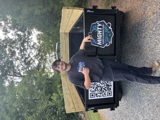 David, coβowner of Mighty Dump and Demolition